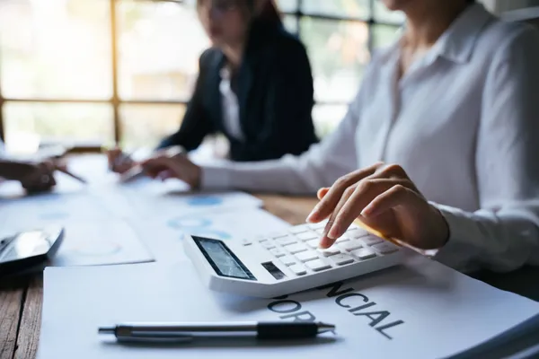 Employee reviewing take-home pay increase on benefits calculator